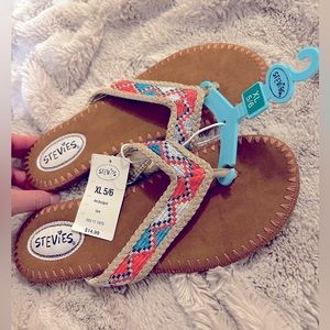 Brand new. Flip flop size 6